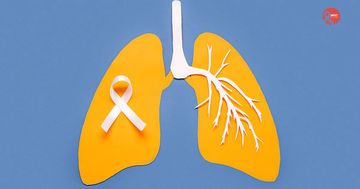 Illustration of human lungs with a white awareness ribbon symbolizing lung cancer support and awareness.