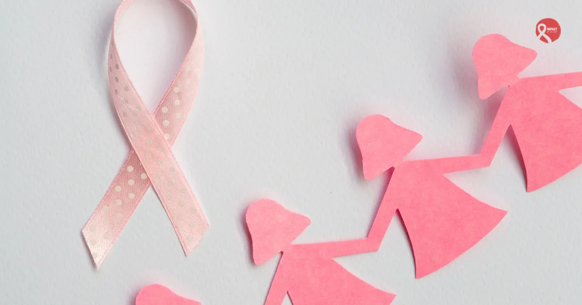 Pink breast cancer awareness ribbon with paper cut-out women symbolizing breast cancer types and awareness.