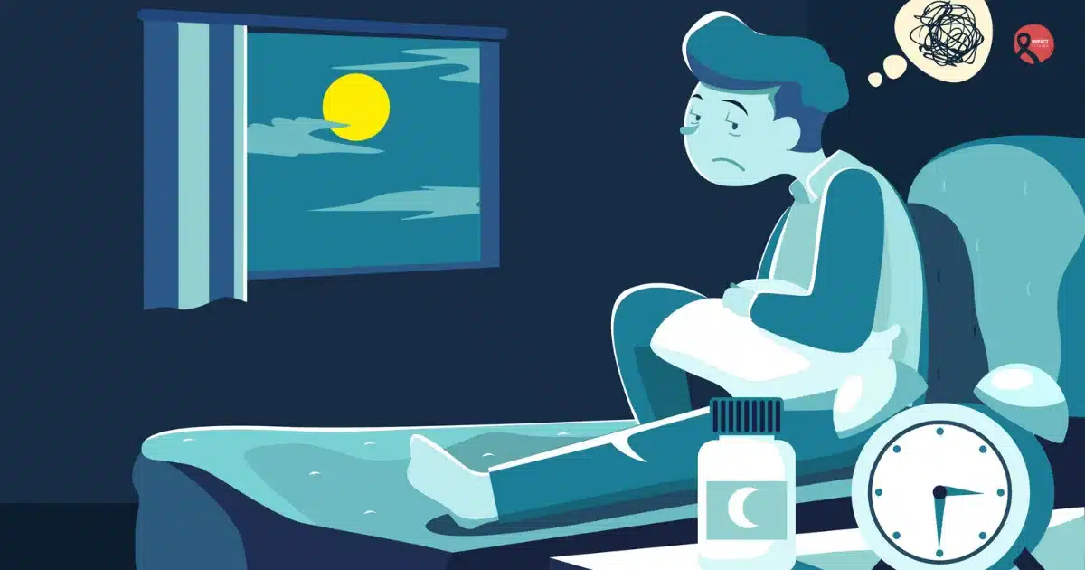 A person sitting awake in bed at night, looking tired and worried, symbolizing nighttime symptoms and health concerns related to cancer.
