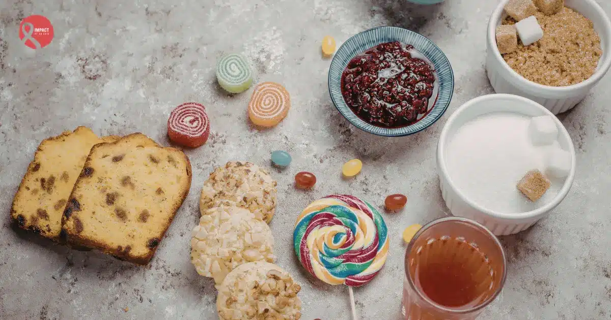 Assorted sugary foods and candies representing Artificial Sweeteners and their link to cancer risk.