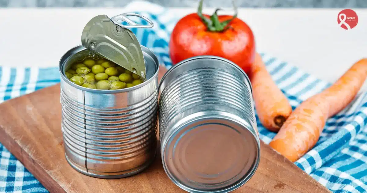 Open can of vegetables illustrating concerns about Canned Foods and cancer risk.